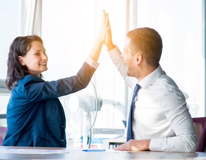 law Practice Xelerator - Image law Practice Xelerator two businesswoman businessman giving hi five office 23 2147899899
